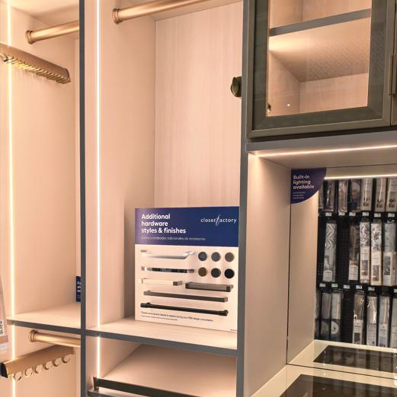 Wardrobe display with illuminated side panels, shelves and hanging compartments